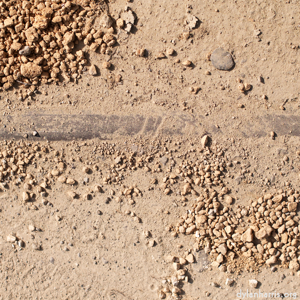 a rail just about visible in sand
