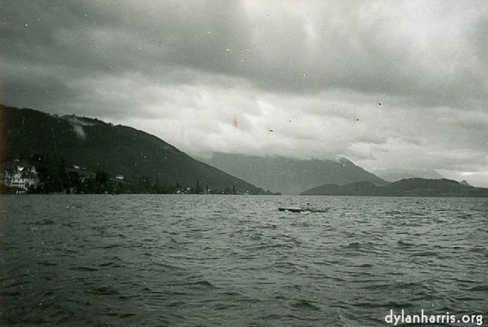 image: Rigi hiddenby clouds, from Lake Zug.