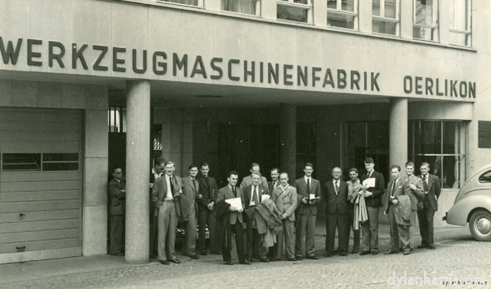 Image: Some of the I.E.E. Party. At the main entrance to Werkzeugmaschinenfabrik Oerlikon Buhle & Co. Oerlikon. Zürich. 19 August 1948.